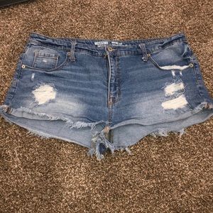 Distressed denim shorts